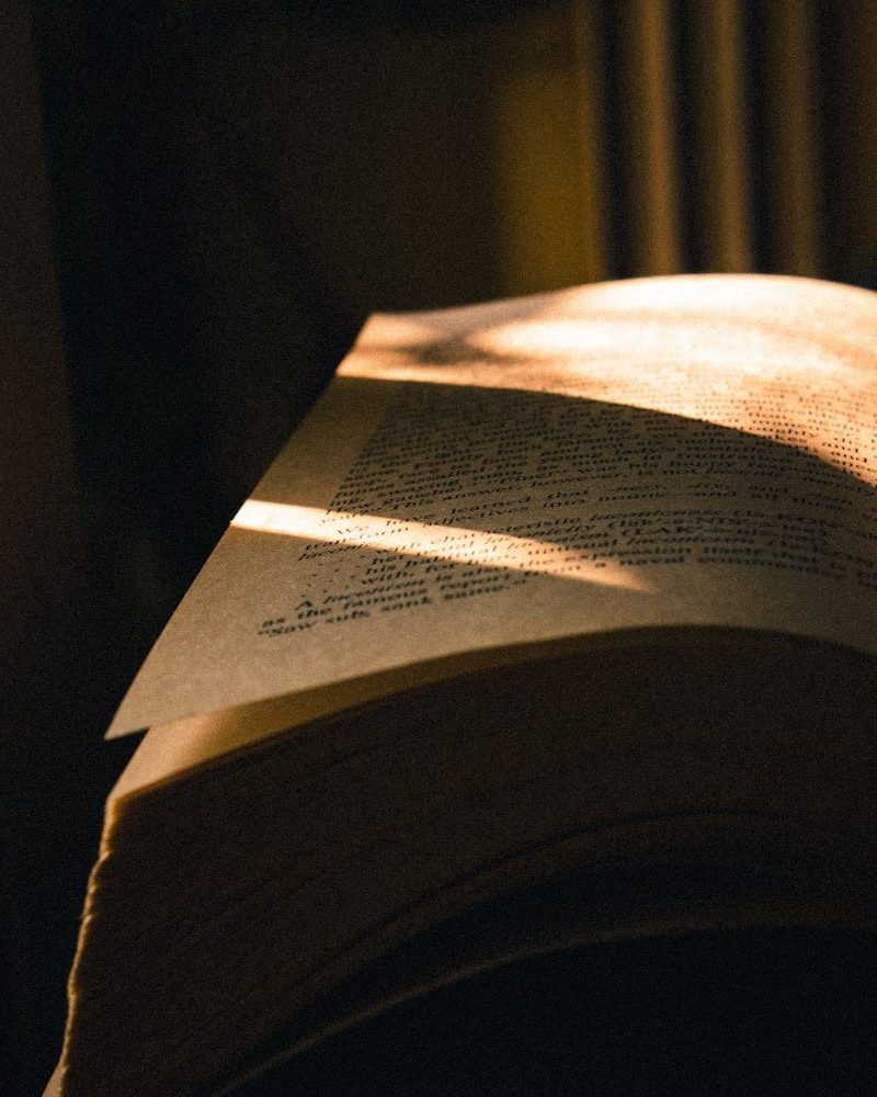 white printer paper on black textile